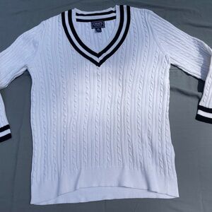Lightweight white varsity type sweater with black trim.